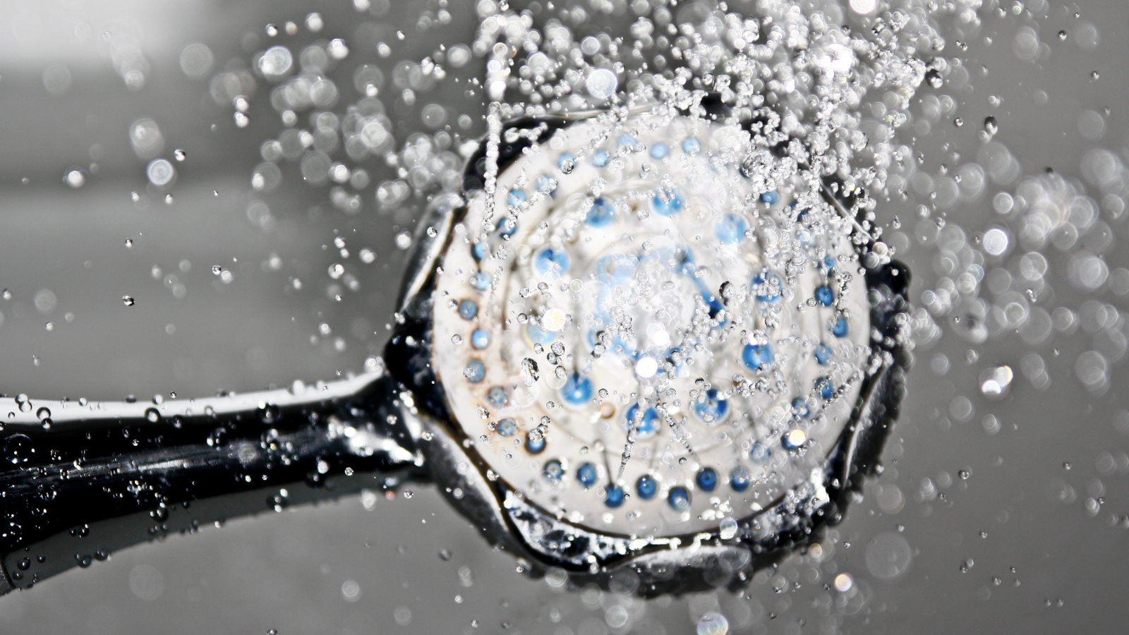Take climate action at home by taking shorter showers to save water.